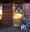 Shelby and Scout on the porch of the cabin.